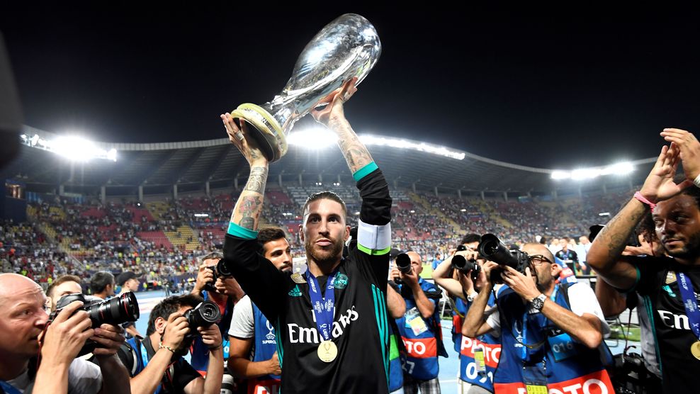 Real Madrid's Spanish defender Sergio Ramos holds the trophy after winning the UEFA Super Cup football match between Real Madrid and Manchester United on August 8, 2017, at the Philip II Arena in Skopje. / AFP PHOTO / Dimitar DILKOFF (Photo credit should read DIMITAR DILKOFF/AFP/Getty Images)